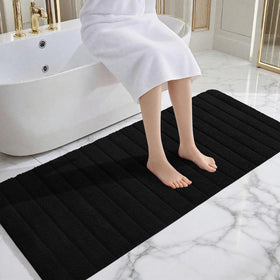 AROGAN non-slip TRP backing keeps the rug steady on tiles.