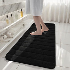 AROGAN plush microfiber bath mat shows high absorbency and thickness.
