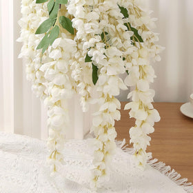 AROIUO wisteria garland closeup petals highlights silk texture.