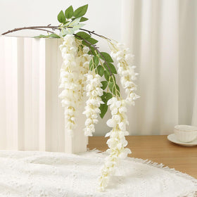 AROIUO wisteria garland pink creates romantic table accents.