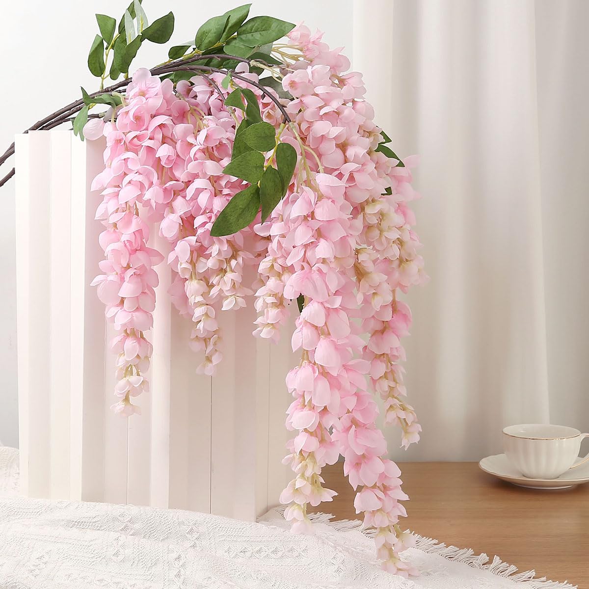 AROIUO purple wisteria hanging flowers enhance garden party ambience.