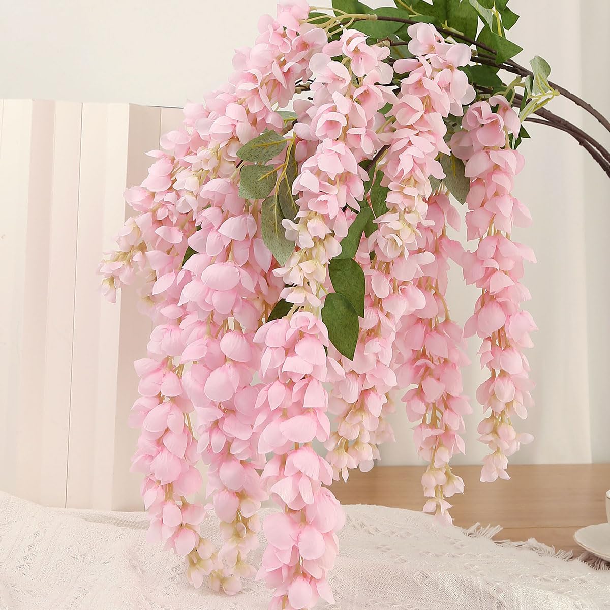 AROIUO white silk wisteria hanging flowers for elegant wedding backdrops.
