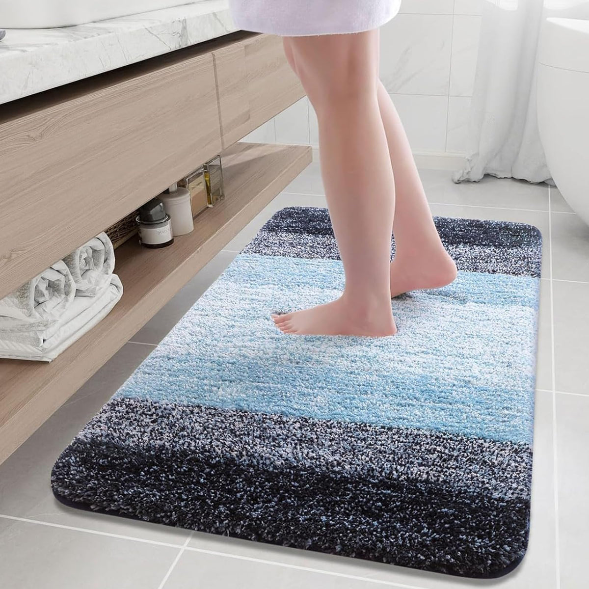 Arotive microfiber bath rug top view reveals plush blue surface for warm feet after showers.