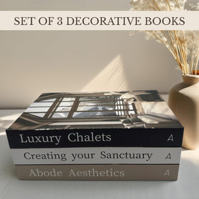 Array & Arrow decorative book set on a coffee table, neutral tones blend with any style.