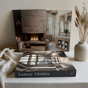Array & Arrow neutral-toned hardcover faux books on bookshelf add understated elegance.