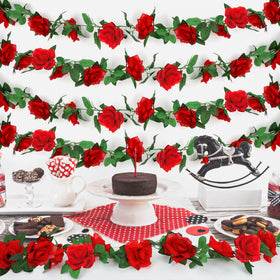 Arrowom Derby party backdrop with lifelike roses creates a celebratory setting.