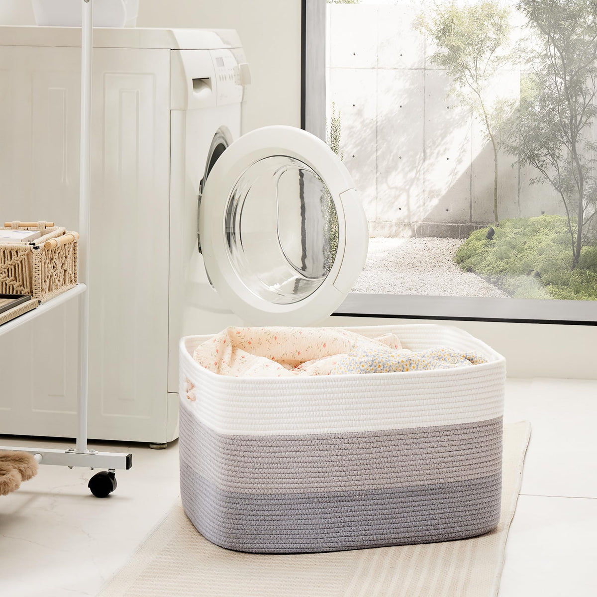 Artfeel nursery storage basket organizing blankets and toys.