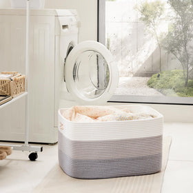 Artfeel nursery storage basket organizing blankets and toys.