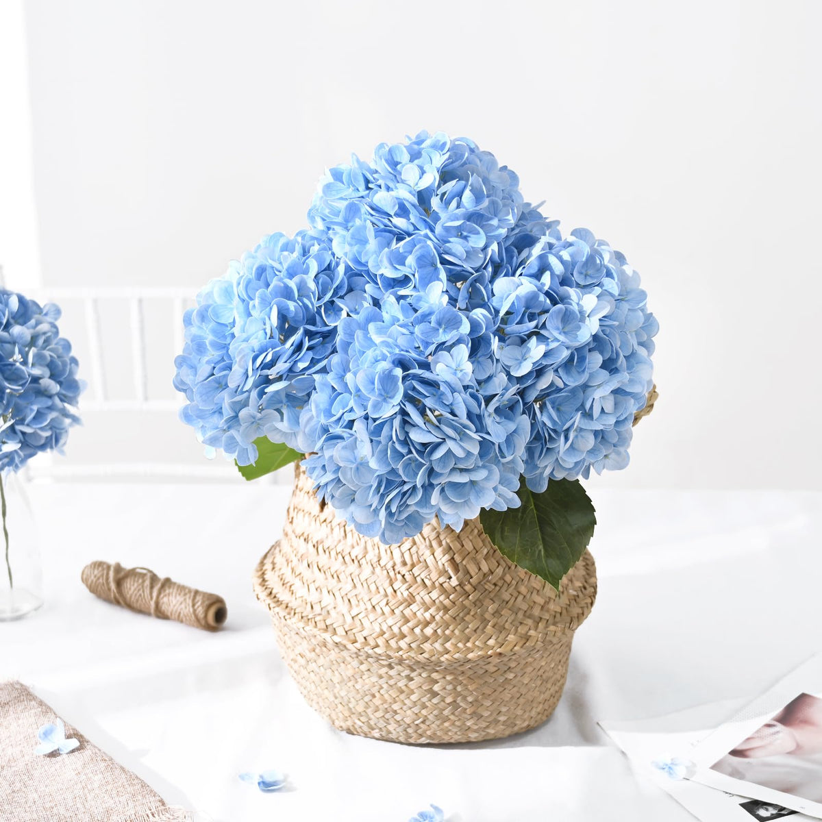 Artflower blue hydrangea makes elegant wedding table centerpieces and photo backdrops.