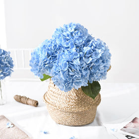 Artflower blue hydrangea makes elegant wedding table centerpieces and photo backdrops.