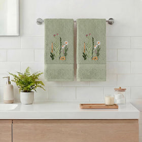 Artoid Mode sage green towel shows soft cotton and plush texture for drying hands.
