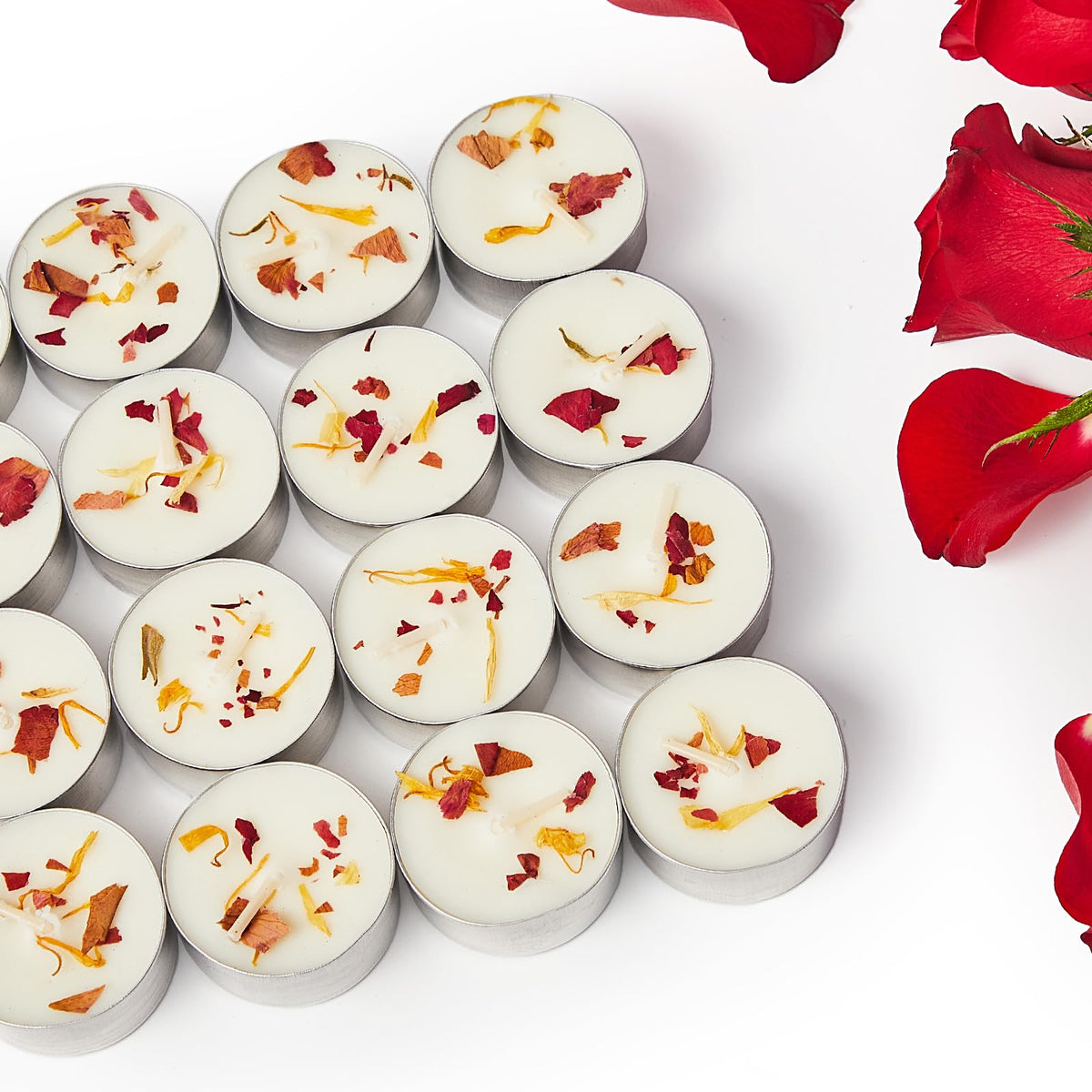 Ashlux rose-petal tealight with real petals for calming bath ambiance.