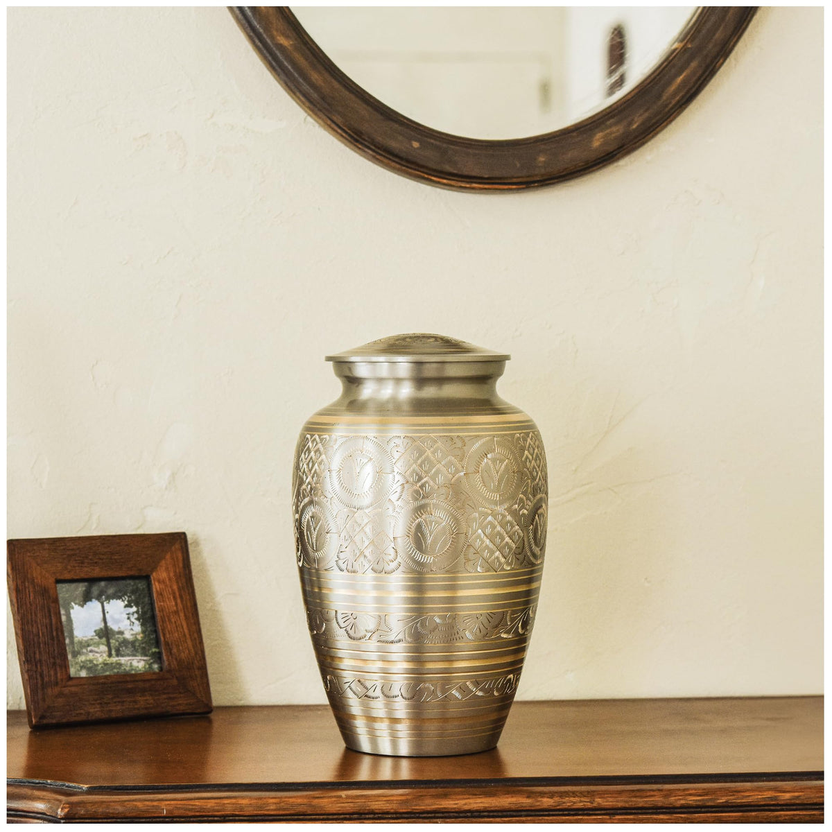 Aspen Studio Platinum Brass Urn interior space for ashes.