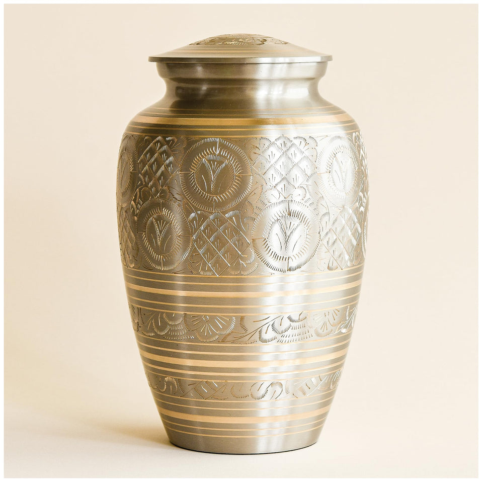 Aspen Studio Platinum Brass Cremation Urn exterior detail for a durable, elegant finish.