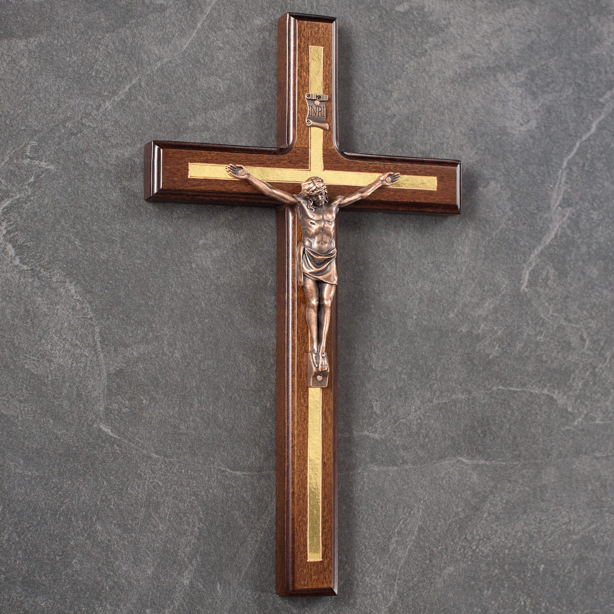 Asterom wall crucifix with keyhole slot for easy hanging.