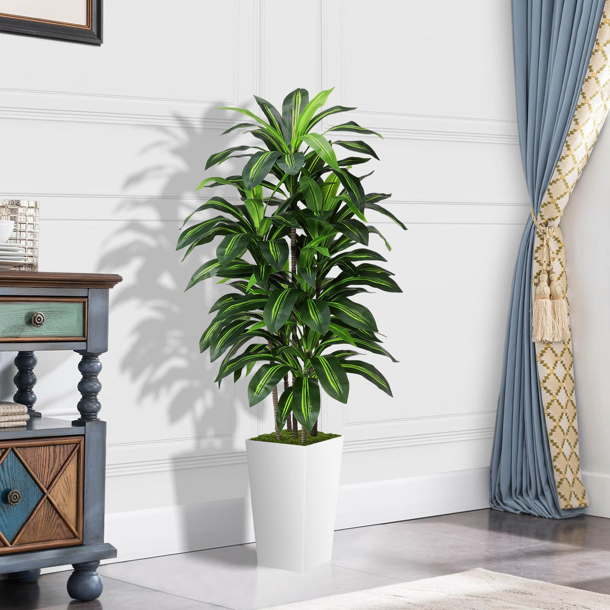 Close-up of ASTIDY artificial dracaena tree showing lifelike stems and leaves.