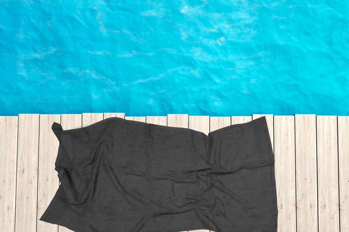 ASTILTEX gym and spa towel in charcoal grey, ideal for workouts and post-shower use.