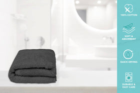 ASTILTEX machine-washable charcoal-grey towel shown in a clean bathroom setting.