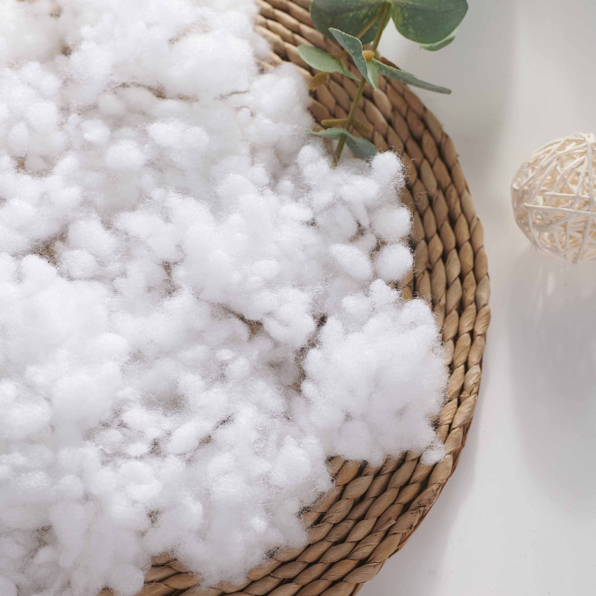 Asuprui white polyester filler keeps poufs soft and comfortable.