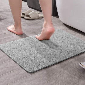 Asvin nonslip bath mat drain design demonstrates secure placement for wet spaces.