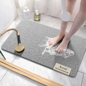 Asvin soft textured bath mat closeup shows non-slip texture for safer baths.