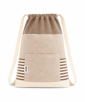 ATANI Turkish Beach Towel 2-in-1 backpack in use for hands-free beach days.