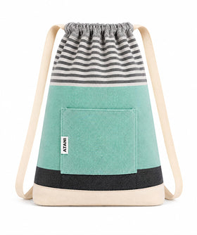 ATANI Turkish Beach Towel converts to a backpack for hands-free lounging.