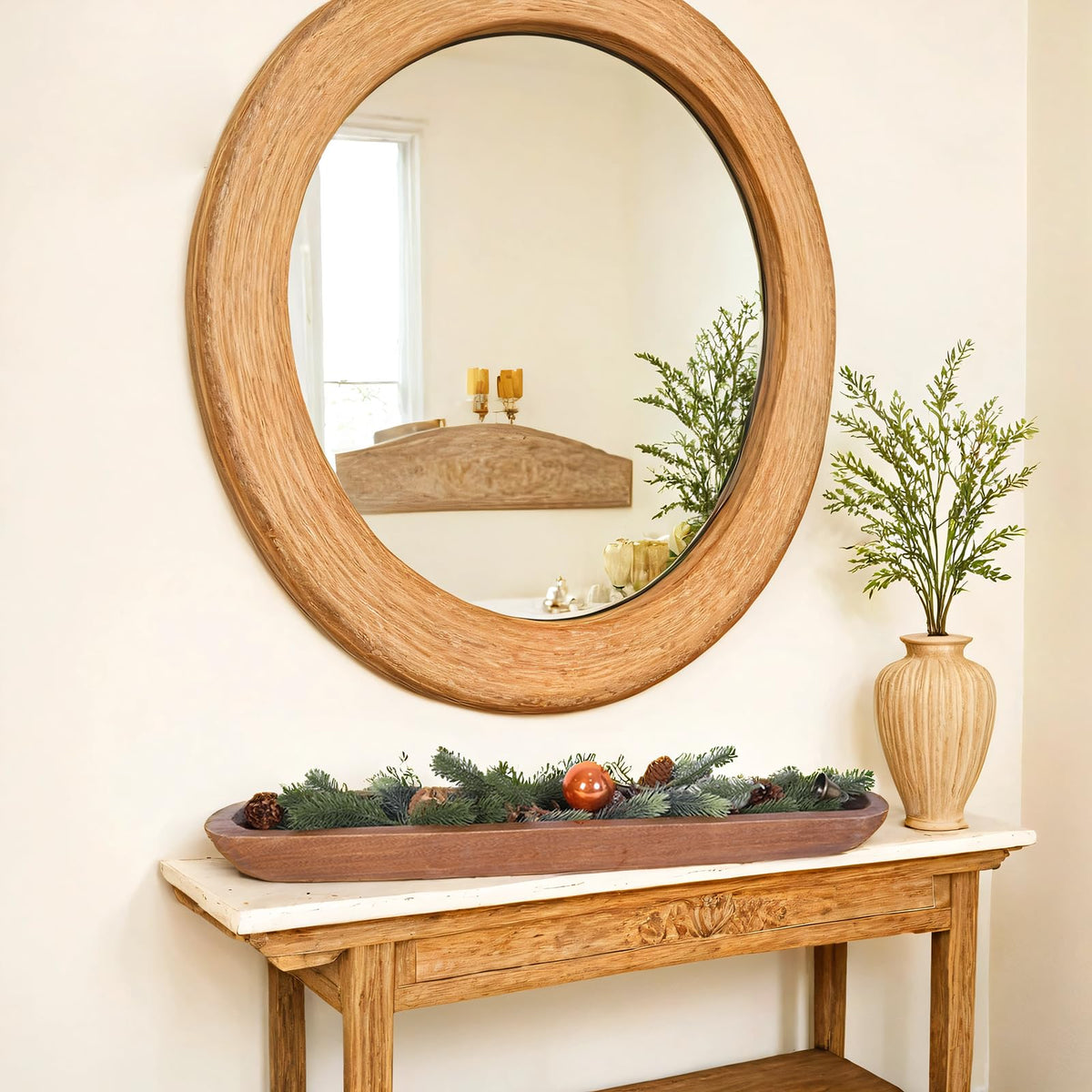 Athaliah dough bowl centerpiece on dining table for dramatic styling.