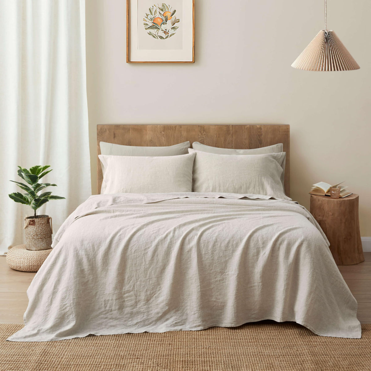 ATLINIA flax bedding fabric texture closeup highlights breathable, year round comfort.