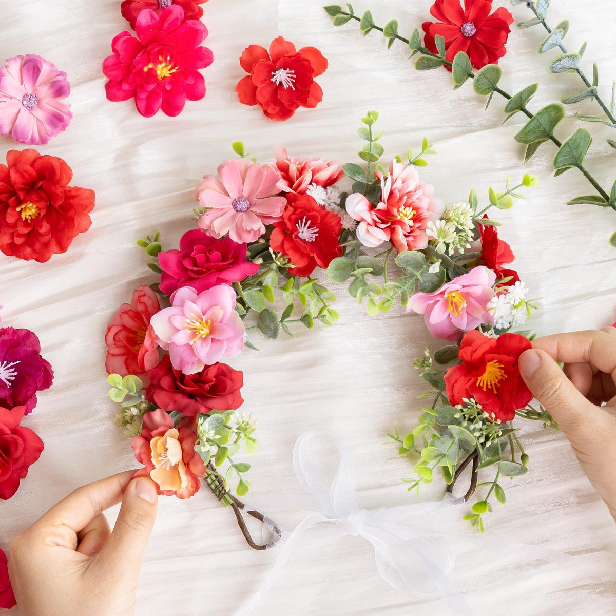 ATTGREAT durable faux silk flower heads with plastic backing.