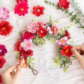 ATTGREAT durable faux silk flower heads with plastic backing.
