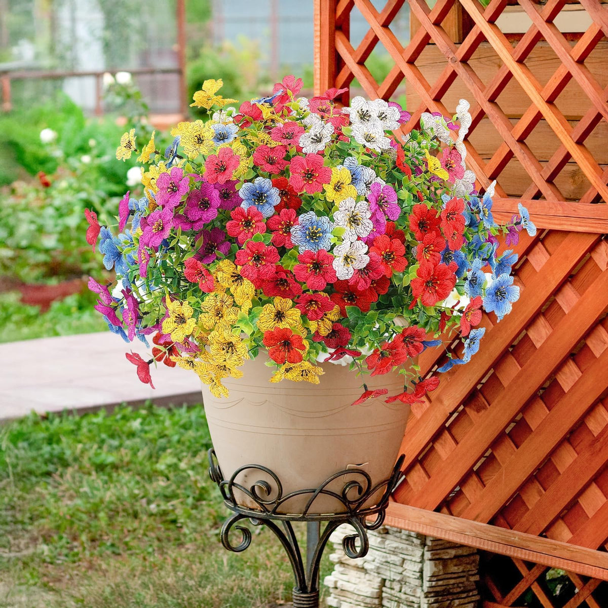 ATTGREAT indoor-outdoor daisies adding color to a sunlit window box