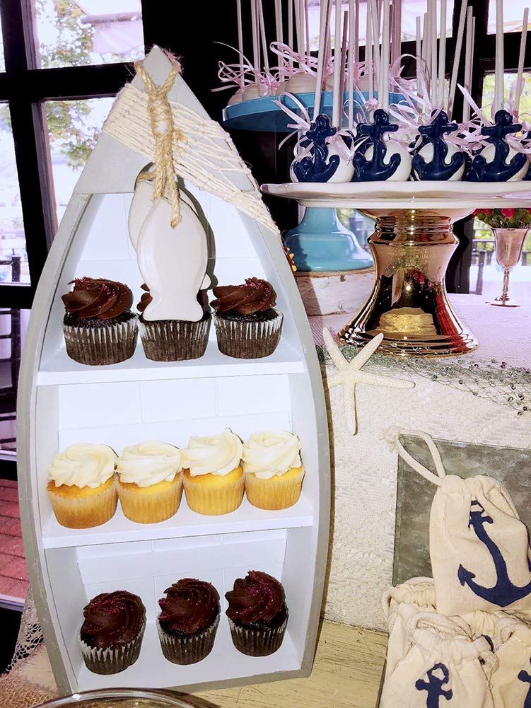 Attraction Design starfish and seashell accents add seaside whimsy to display
