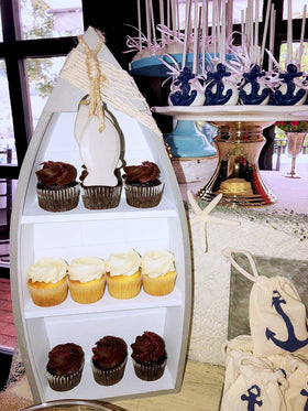 Attraction Design starfish and seashell accents add seaside whimsy to display