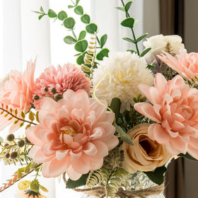 Aubcee glass vase with heart pendants enhances a gift-ready centerpiece