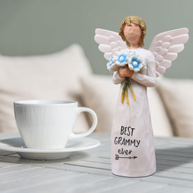 AUKEST Christmas Grammy gift statue enhances home decor.