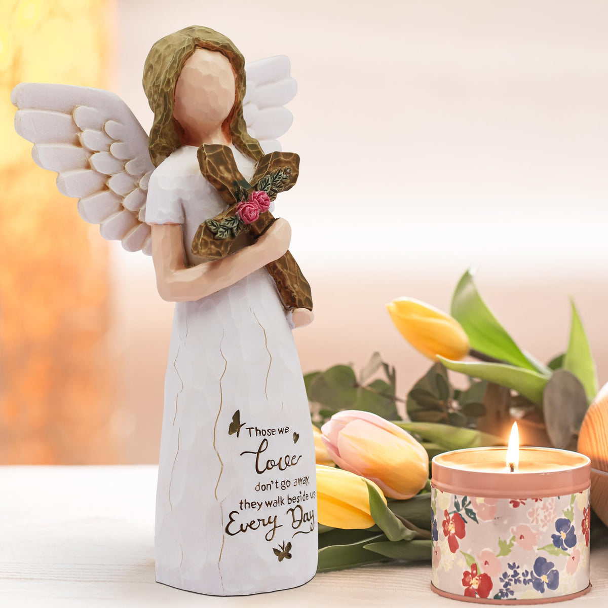 AUKEST sympathy angel wearing cream dress with cross and floral accents; ideal remembrance keepsake