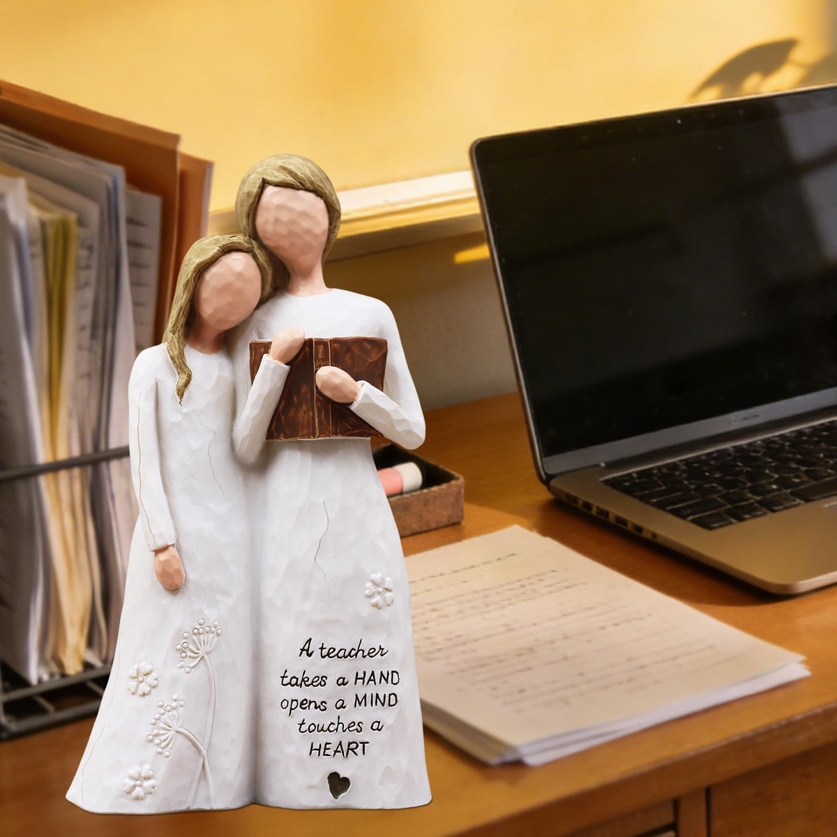 AUMELO faceless design figurine honors educators' mentorship during holidays and celebrations