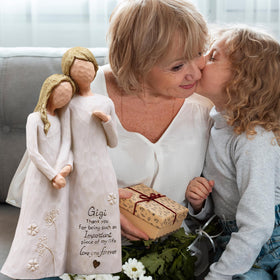 AUMELO Gigi sculpture with neutral hues complements any decor.