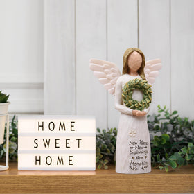 AUMELO resin angel detail robe highlights artistry for modern or rustic interiors