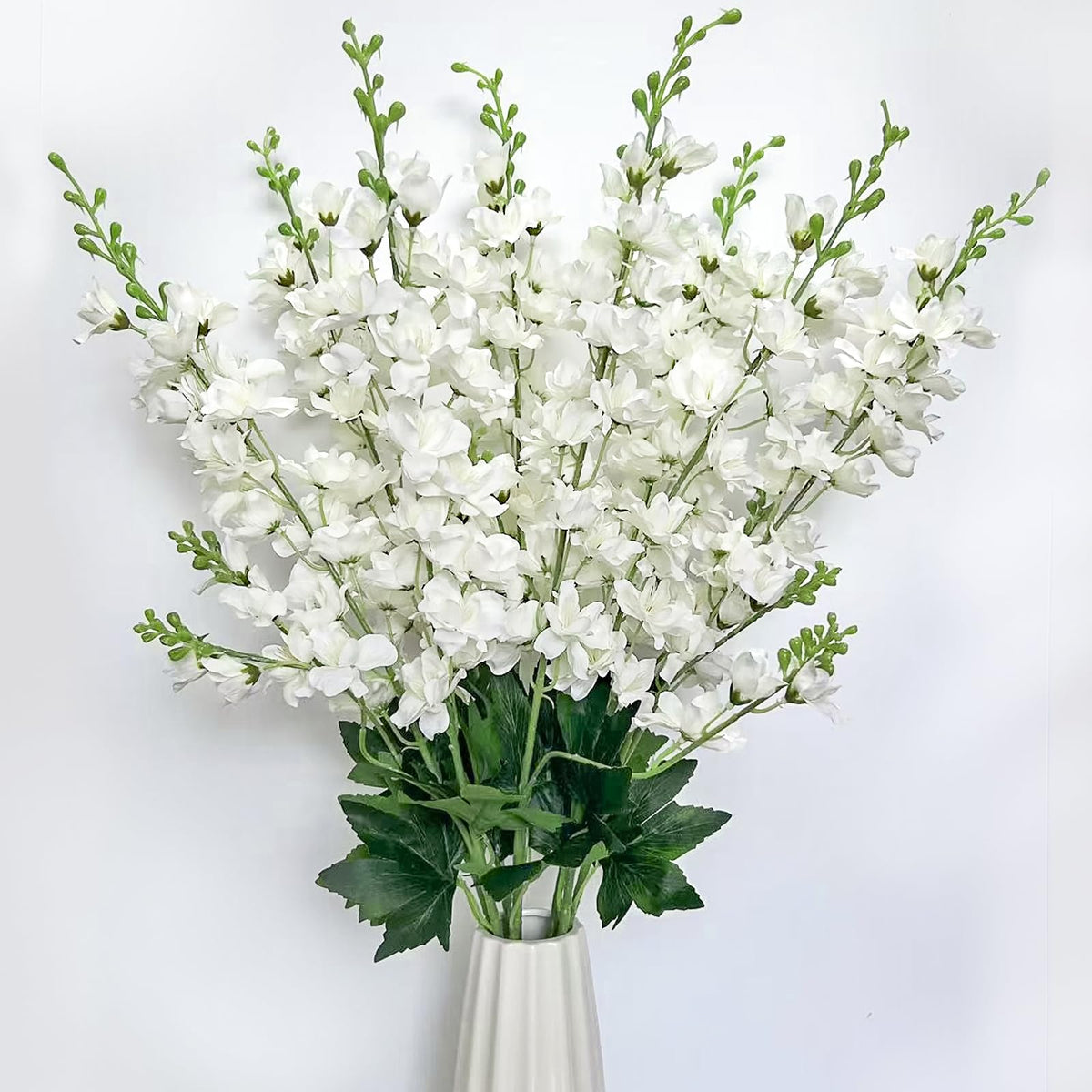 aunosit white delphinium bouquet in tall vase for elegant home decor