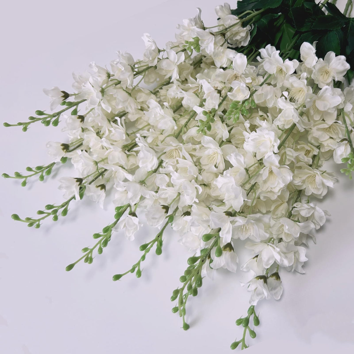 aunosit white delphinium bouquet arranged for wedding centerpiece