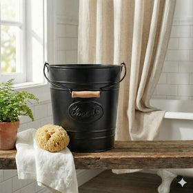 Autumn Alley trash can with wooden handle adds rustic charm and easy carrying.