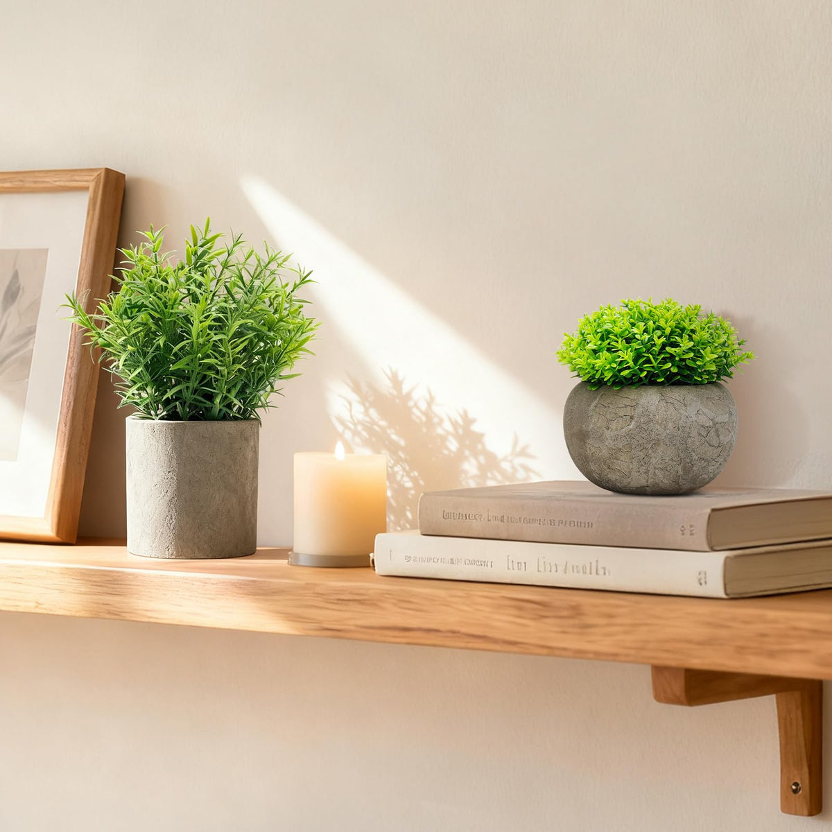 AUUGUU faux greenery in a minimalist cement pot boosts office desk ambiance.