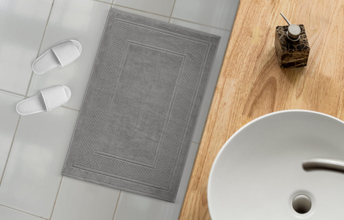 Avalon Towels grey bath mat is machine-washable for easy refresh