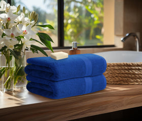 Avalon Towels royal blue washcloths offer gentle exfoliation and plush softness for skincare.