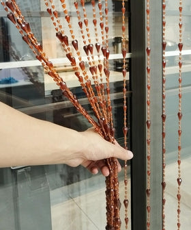ave split tension rod installation demonstrates easy setup for doorways with shimmering beads