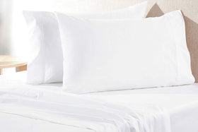 Aveesha pillowcase white close-up texture shows soft percale feel.