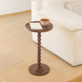 AWASEN pedestal table with solid wood legs enhances room decor.