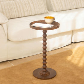 AWASEN round drink table in a living room setup for compact spaces.